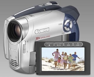 Canon DC201 DVD Camcorder with family photo on display.