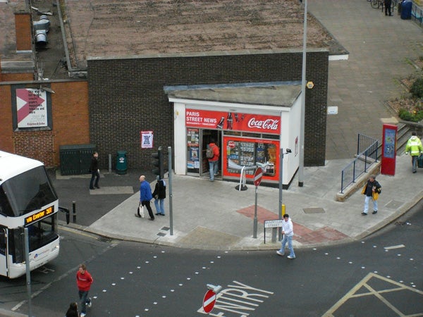 Overhead view of street corner and newsstand from above.Bird's eye view of a street corner and newsstand
