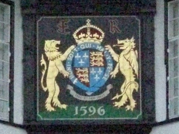 Coat of arms plaque with lions and a date from 1596.Emblem with lions and a shield, date 1596, photograph.