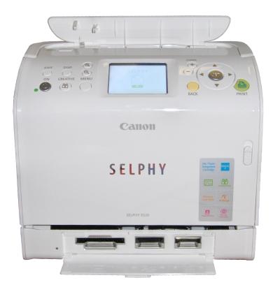 Canon Selphy ES20 compact photo printer on white background.