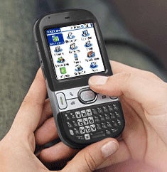 Person holding a Palm Centro Smartphone with screen visibleHand holding a Palm Centro smartphone with screen visible.