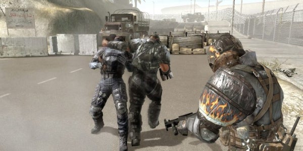 Screenshot from 'Army of Two' video game showing two characters in combat.In-game screenshot from Army of Two featuring two characters in combat.