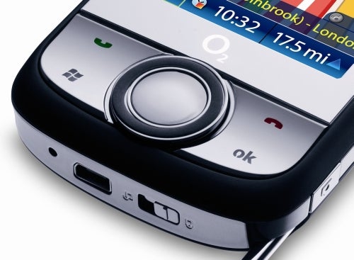 Close-up of O2 XDA Orbit 2 smartphone with navigation screen.