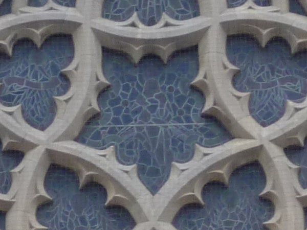 Close-up of architectural detail captured by Panasonic Lumix DMC-LZ10.Close-up of intricate stone lattice work architecture.