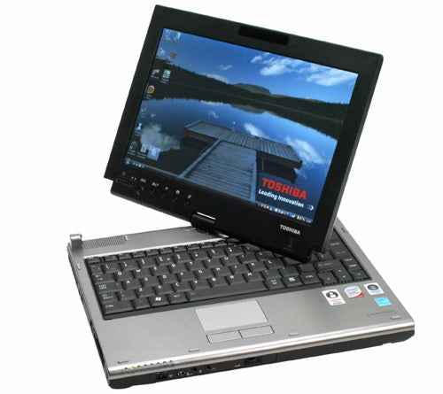 Toshiba Portege M700 laptop with screen rotated into tablet mode.Toshiba Portege M700 laptop with screen in tablet mode.