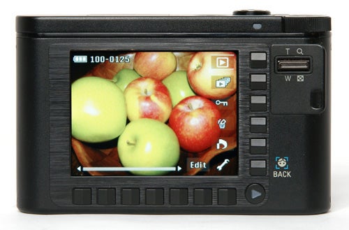 Samsung NV15 digital camera displaying an image of apples on screen.Samsung NV15 Digital Camera displaying photo of apples on screen.