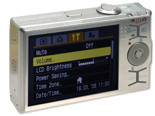 Canon IXUS 90 IS camera with settings menu displayed on screen.Canon IXUS 90 IS camera displaying menu options on screen.