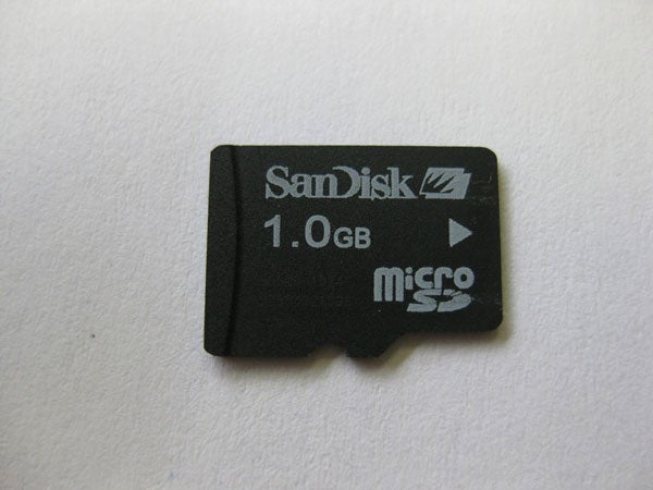 SanDisk 1.0 GB microSD memory card on white backgroundSanDisk 1GB microSD memory card on white background.