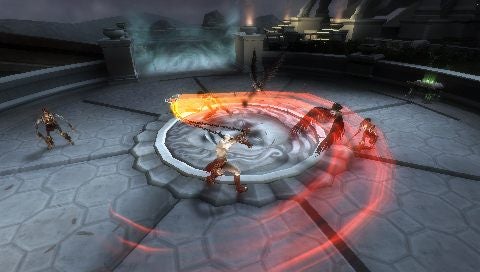 Gameplay screenshot from God of War: Chains of Olympus.Gameplay from God of War: Chains of Olympus showing combat scene.