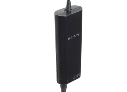 Sony PFR-V1 headphones battery unit on white background.Sony PFR-V1 headphone accessory on white background.