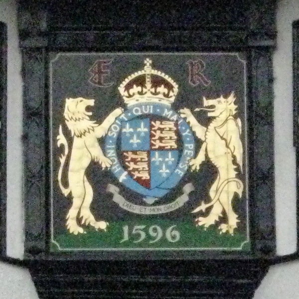 Coat of arms with lions and date '1596' on stained glass window.Coat of arms with heraldic lions from 1596.