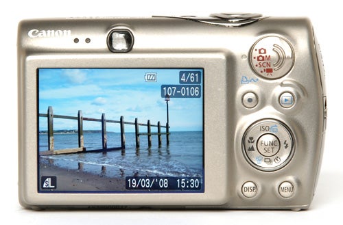 Canon IXUS 960 IS digital camera displaying a beach photo.Canon IXUS 960 IS digital camera displaying a beach photo on screen.