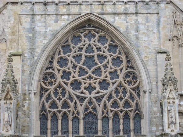 Intricate gothic window architecture captured with Canon IXUS 960 ISDetailed photo of Gothic church window architecture.
