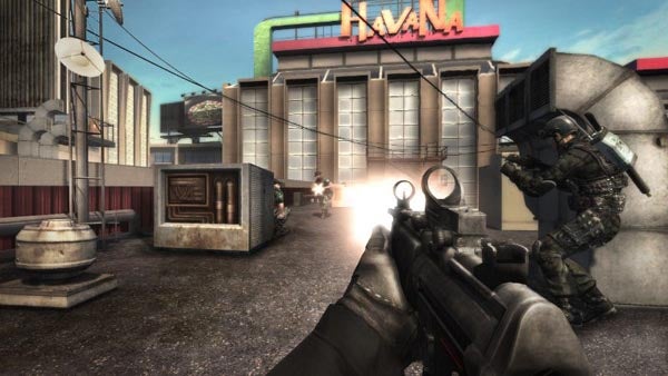 Rainbow Six Vegas 2 gameplay screenshot with shooting action.