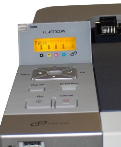 Brother HL-4070CDW color laser printer control panel.Close-up of Brother HL-4070CDW printer control panel.