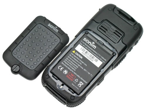 Sonim XP1 Rugged Phone with battery compartment open.Sonim XP1 Rugged Phone with back cover removed