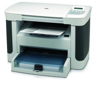 HP LaserJet M1120 MFP multifunction printer on white background.