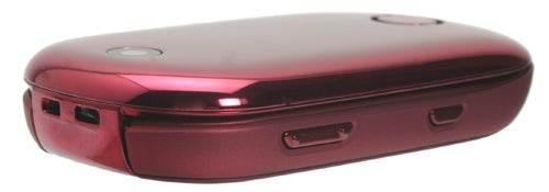 Motorola U9 phone in pink showing side ports.Motorola U9 mobile phone in glossy maroon color.