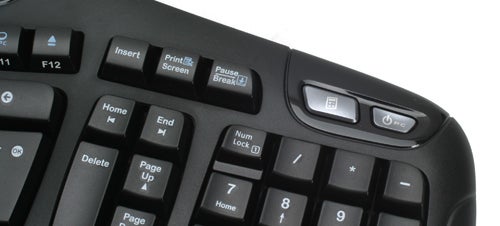 Close-up of a black Logitech Wave Keyboard with media keys.Close-up of a Logitech Wave Keyboard's keys and media controls.