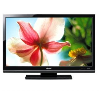 Sharp LC-46XL2E 46-inch LCD TV displaying a flower.
