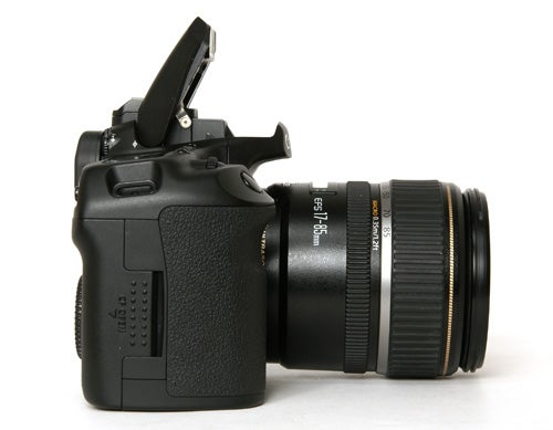 Canon EOS 40D DSLR camera with lens and open flash.