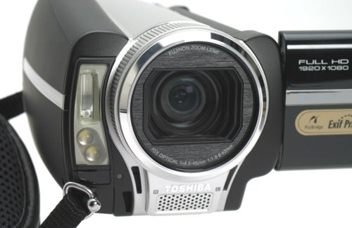 Close-up of Toshiba Gigashot A100FE camcorder lens and controls.Close-up of Toshiba Gigashot A100FE camcorder lens and body.