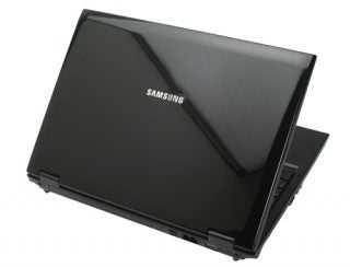 Black Samsung R700 laptop on a white background.