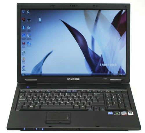 Samsung R700 laptop with open lid displaying screenSamsung R700 laptop with open screen displaying desktop