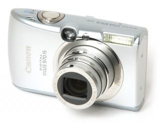 Canon Digital IXUS 970 IS compact camera displayed on white background.