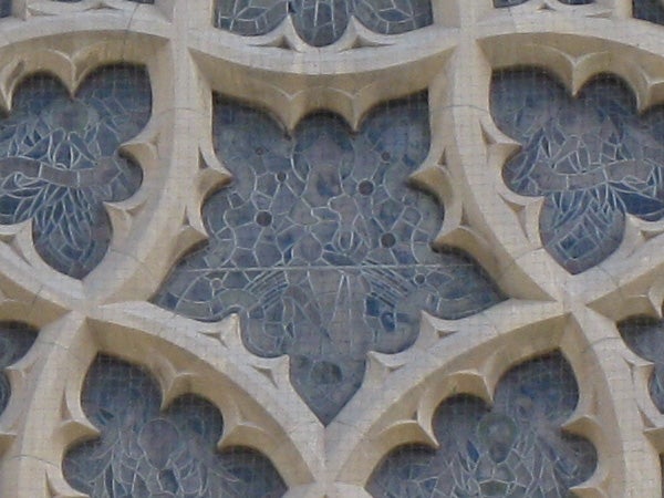 Close-up of intricate stone church window patterns.Close-up of intricate stone church window lattice design