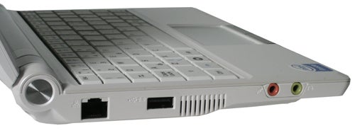 Side view of Asus Eee PC 900 showing ports and keyboard.Close-up of Asus Eee PC 900 side ports and keyboard.