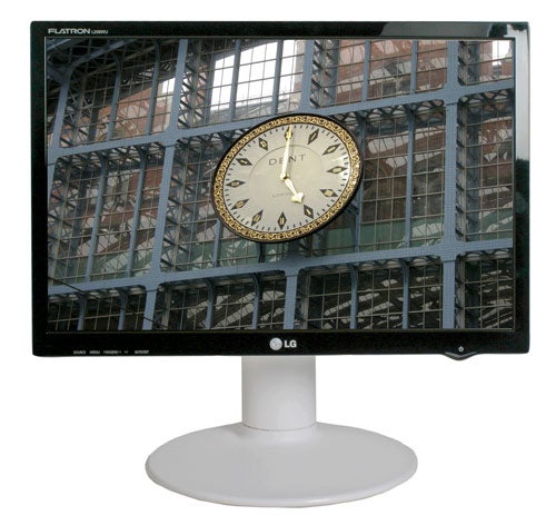 LG Flatron L206WU monitor displaying a clock on screen