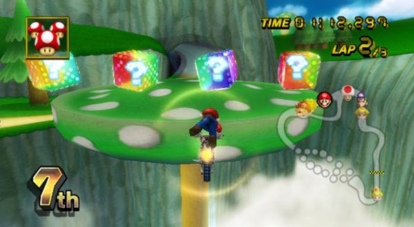 Mario Kart Wii gameplay on a mushroom-themed track.Mario Kart Wii gameplay on a mushroom track.