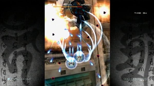 Screenshot of a boss battle in the game Ikaruga.Screenshot of gameplay from Ikaruga video game.