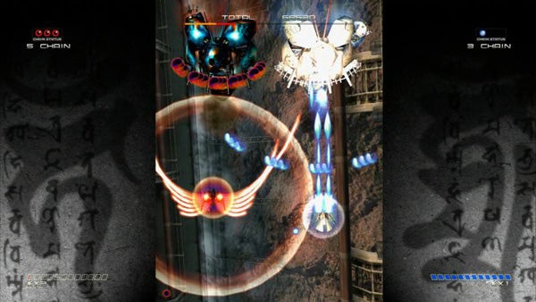 Screenshot of Ikaruga video game in action.Screenshot of Ikaruga game showing ships and bullet patterns.
