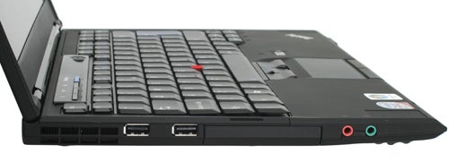 Close-up of Lenovo ThinkPad X300's keyboard and side ports.Lenovo ThinkPad X300 laptop side connectivity ports view.