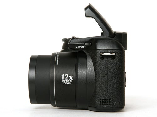 Fujifilm FinePix S1000fd camera with lens extended.Fujifilm FinePix S1000fd digital camera with lens extended.
