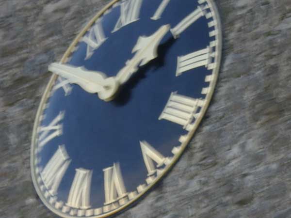 photo of a clock face, demonstrating camera shake.photo of a clock taken with Pentax K200D.