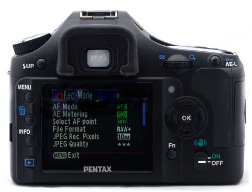Pentax K200D DSLR camera rear view with menu displayed.Pentax K200D digital SLR camera back view with LCD screen.