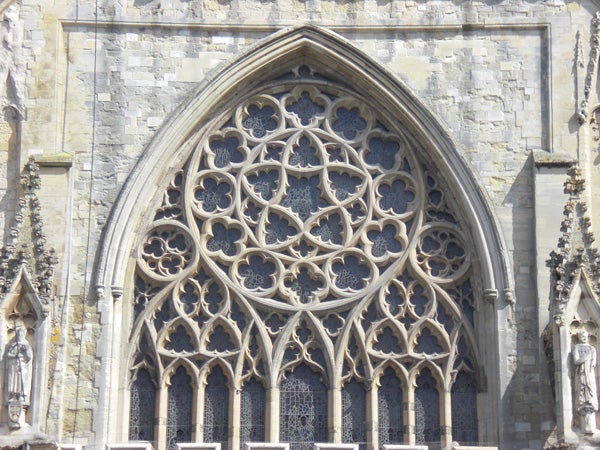 Detailed stone window architecture of a gothic church.Gothic style church window architecture detail