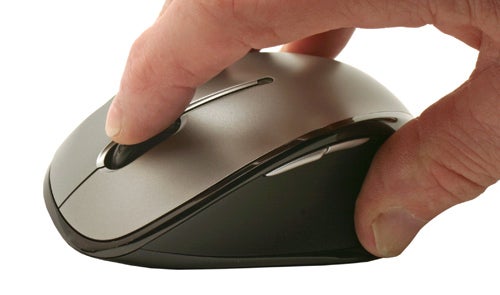 Hand interacting with Microsoft Wireless Laser Mouse 6000 v2.0.