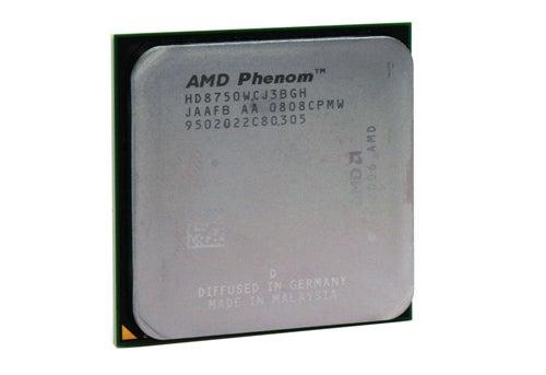 AMD Phenom X3 8750 triple-core processor on white background.AMD Phenom X3 8750 processor on a white background.