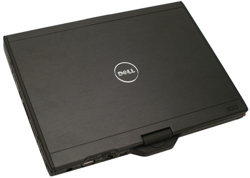 Dell Latitude XT Tablet PC closed on a surface.Dell Latitude XT Tablet PC closed on a flat surface.