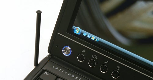 Dell Latitude XT Tablet PC with stylus and control buttons.