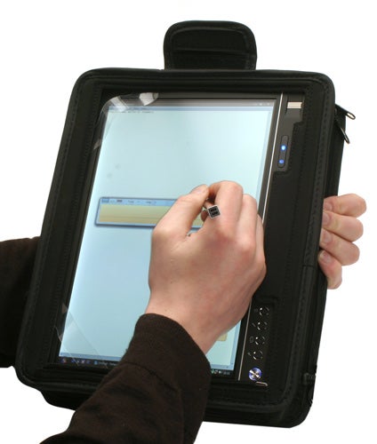Person using a stylus on a Dell Latitude XT Tablet PC.Person using stylus on Dell Latitude XT Tablet PC.