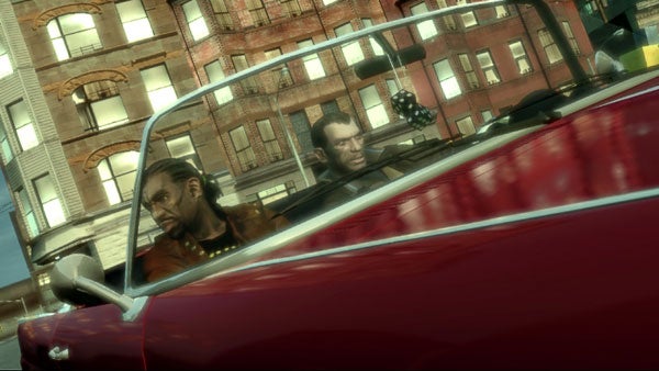 Grand Theft Auto IV characters driving in a red convertible.Two characters driving in Grand Theft Auto IV video game scene.