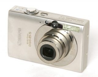 Canon Digital IXUS 85 IS compact camera on a white background.