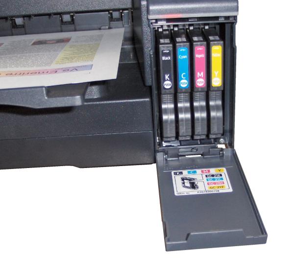 Ricoh Aficio GX2500 printer with open ink cartridge tray.Ricoh Aficio GX2500 printer with open ink cartridge compartment