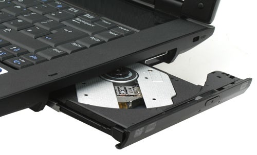 Samsung R60+ notebook with open optical disc drive.