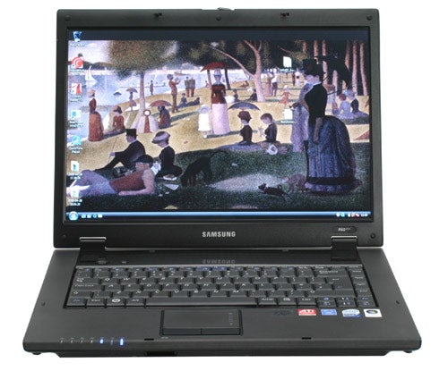 Samsung R60+ 15.4in Notebook open with a desktop wallpaper displayed.Samsung R60+ 15.4-inch Notebook with screen displaying wallpaper.